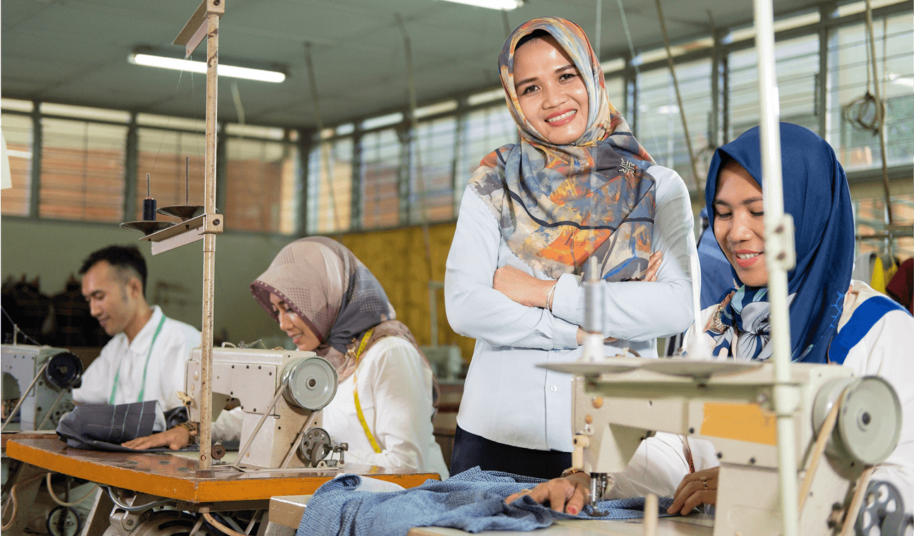 Women working in garment manufacturing facility